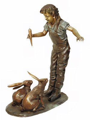 Girl Feeding Her Rabbits