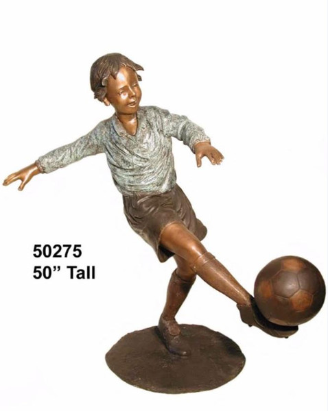 Young Boy Playing Soccer