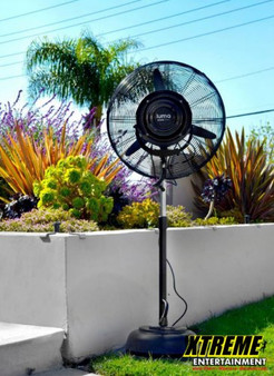 "24-inch outdoor misting fan providing cool air for a patio or outdoor event"