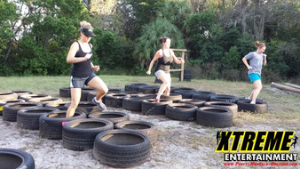 "Custom Obstacle Course designed with unique challenges for outdoor events and team-building"