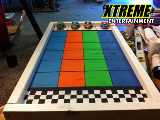 27 ft blue crush dual lane water slide | Party Rentals Of Ft Lauderdale