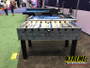 "Waterproof foosball table with weather-resistant features for outdoor fun"