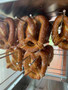 "Pretzel warmer displaying hot, freshly baked pretzels"