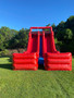 "Big red inflatable slide for kids party rental"
