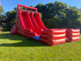 "Big red inflatable slide for kids party rental"