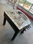 Classic arcade Bubble Hockey machine with dome cover and rod controls — great for retro gaming zones and party rentals.