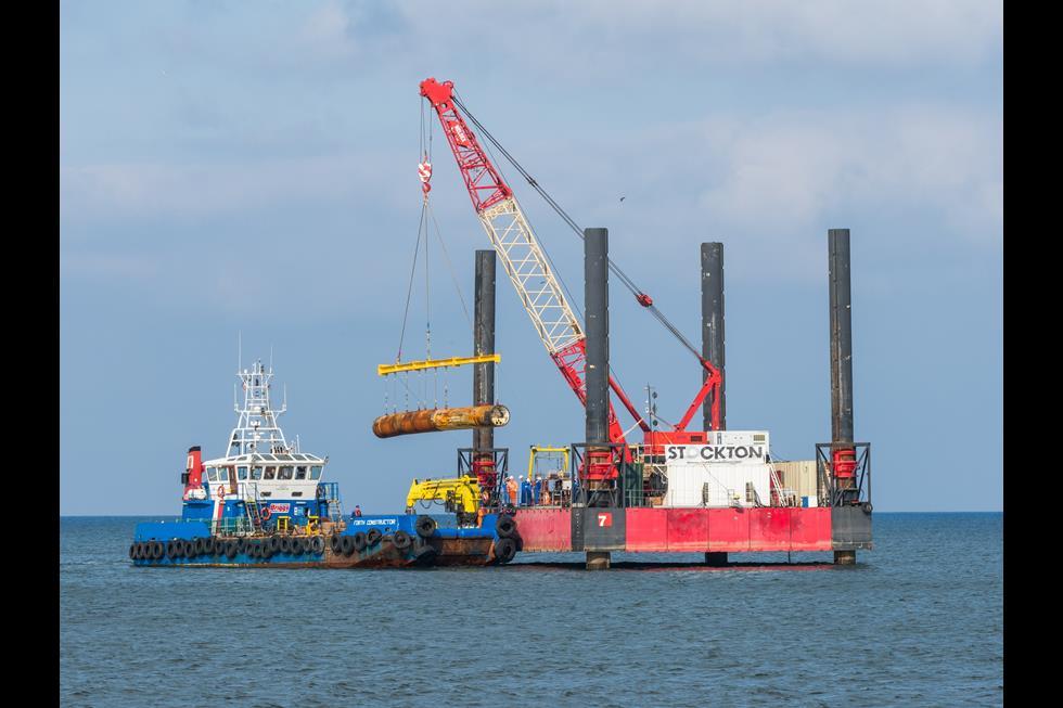 Cranes In The Middle Of The Ocean