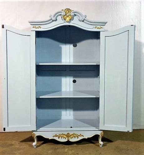 TV armoire with holes and shelves