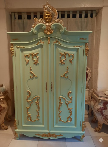 MINT GREEN AND GOLD ARMOIRE WITH CHERUB