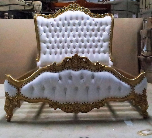 Gold and White Tufted Bed