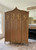 Iroko veneer and gold ARMOIRE