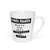 White latte mug with the black text quote: "Public health where the only constant is chaos".