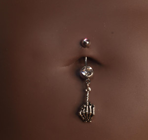 Middle Finger Skull Navel Piercing Middle Finger Skull Navel Piercing