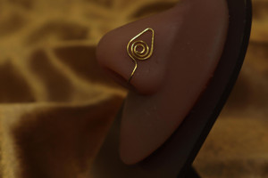 African swirl oval nose cuff African swirl oval nose cuff