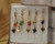Dynamic Dangling Ball with 3-Side Charm nose hoop Dynamic Dangling Ball with 3-Side Charm nose hoop