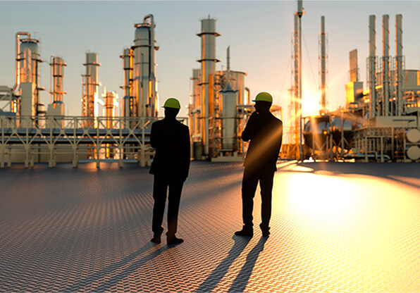 Oil Workers Wearing Hard Hats