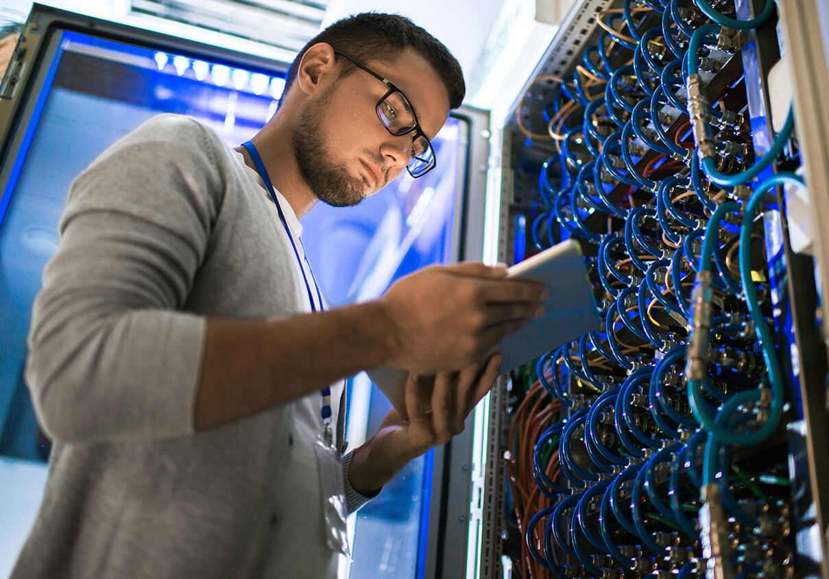 IT guy monitors equipment