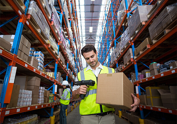 Warehouse Worker Scanning Barcode