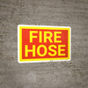 Fire Hose Red and Yellow Landscape - Wall Sign Fire Hose Red and Yellow Landscape - Wall Sign