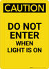 Caution: Do Not Enter When Light Is On - Portrait Wall Sign