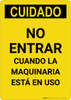 Caution: Do Not Enter When Machinery is in Use Spanish - Portrait Wall Sign