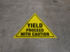 Yield Proceed with Caution Floor Sign