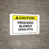 Caution - Proceed Slowly Open Pits Caution - Proceed Slowly Open Pits