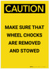 Caution: Make Sure Wheel Chocks Are Removed and Stowed Portrait - Label