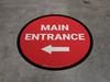 Main Entrance Left with Arrow Circular - Floor Sign Main Entrance Left with Arrow Circular - Floor Sign