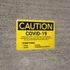 Caution: Covid-19 - Report to Front Desk - Symptoms Landscape - Wall Sign Caution: Covid-19 - Report to Front Desk - Symptoms Landscape - Wall Sign