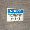 Notice: Social Distancing Practiced Here with Icon Landscape - Wall Sign