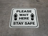 Please Wait Here Stay Safe Shoe Prints Square - Floor Sign