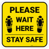 Please Wait Here Stay Safe Shoe Prints Yellow Square - Floor Sign