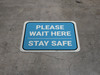Please Wait Here Stay Safe Blue Rectangle - Floor Sign