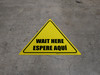 Wait Here Espere Aqui Bilingual Spanish Triangle - Floor Sign