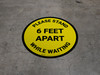 Please Stand 6 Feet Apart While Waiting Yellow - Circular - Floor Sign