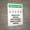 Health First: Practice Social Distancing While Using Urinal with Icon Portrait - Wall Sign