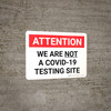 Attention: We Are Not A Covid-19 Testing Site Landscape - Wall Sign