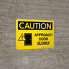 Caution: Approach Door Slowly Landscape With Icon - Wall Sign