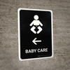 Baby Care With Left Arrow Black Portrait - Wall Sign
