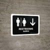 Restrooms With Down Arrow Black Bilingual Spanish Landscape - Wall Sign