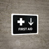 First Aid With Down Arrow Black Landscape - Wall Sign