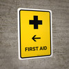First Aid With Left Arrow Yellow Portrait - Wall Sign
