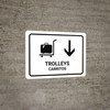 Trolleys With Down Arrow White Bilingual Spanish Landscape - Wall Sign