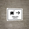Trolleys With Right Arrow White Bilingual Spanish Landscape - Wall Sign
