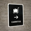 Trolleys With Right Arrow Black Spanish Portrait - Wall Sign