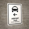 Airport Taxi With Left Arrow White Bilingual Spanish Portrait - Wall Sign