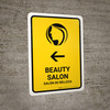 Beauty Salon With Left Arrow Yellow Bilingual Spanish Portrait - Wall Sign