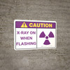 Caution: X Rays On When Flashing - Wall Sign
