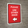 Please Use Other Door Left Arrow Red Portrait - Wall Sign Please Use Other Door Left Arrow Red Portrait - Wall Sign